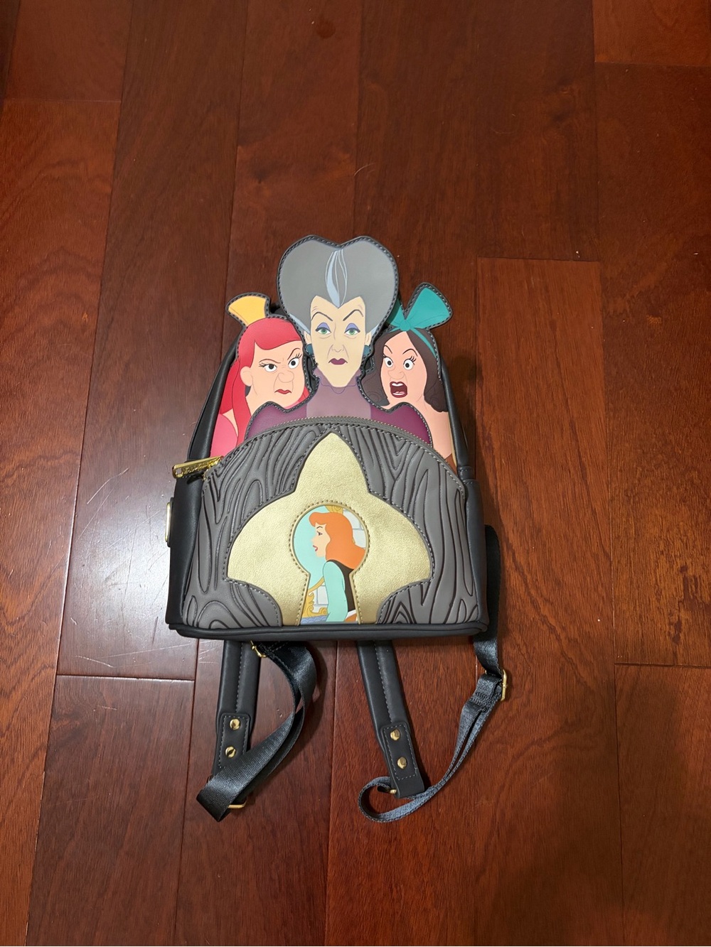 Loungefly Disney Villains Mini Backpack in Black, Gray and Gold Accents